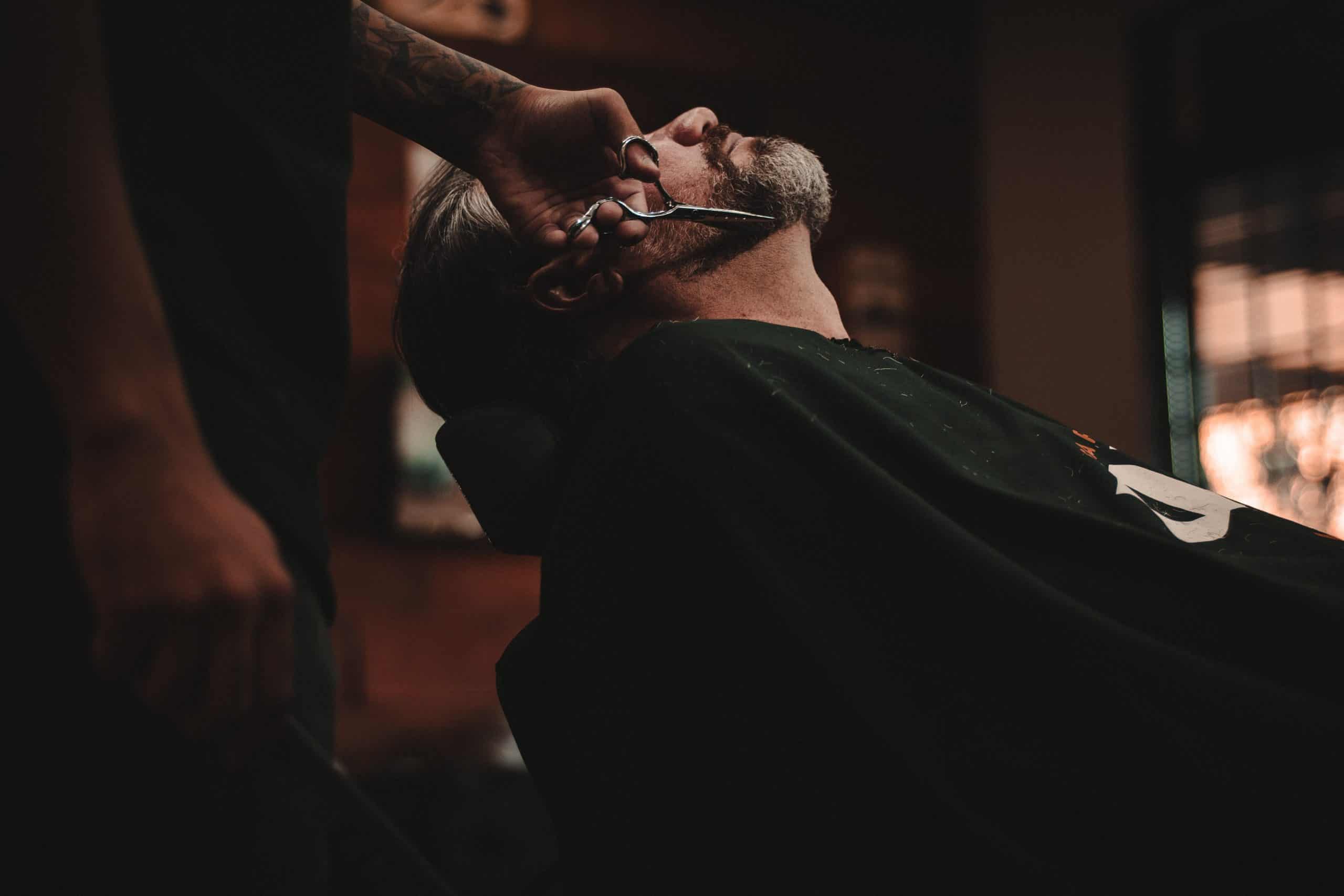 barber trimming neckbeard
