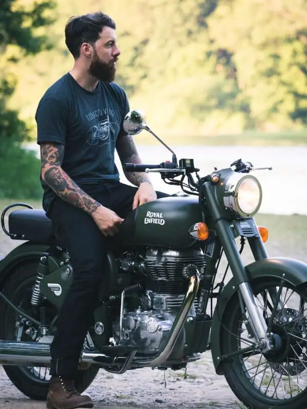 bearded man on motorbike
