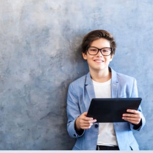 young boy with glasses